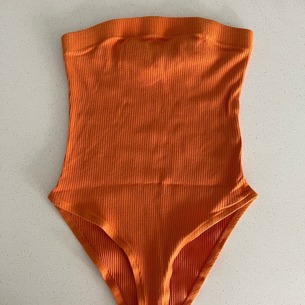 Orange bodysuit from nasty gal